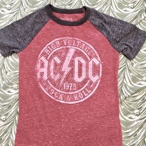 This is a kids AC/DC vintage red shirt with grey sleeves and a collar. White